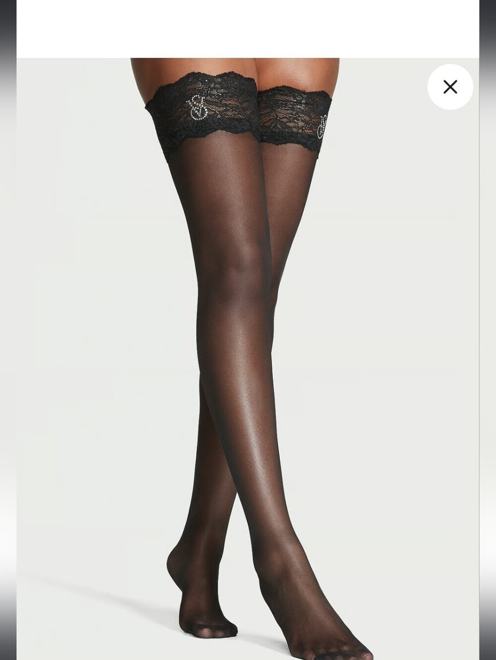 sheer Black thigh-high stockings featuring delicate lace trim. 3 Pair Lot